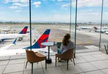 Airlines bank on splurging vacationers as clouds form on economy